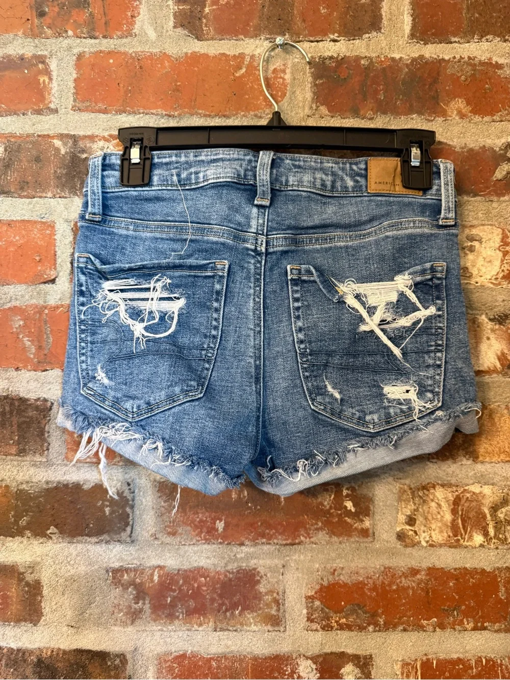 P125 - American Eagle Outfitters Distressed Light Blue Denim Cutoff Shorts